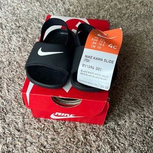 Size 4C toddler Nike sandals - black with white logo